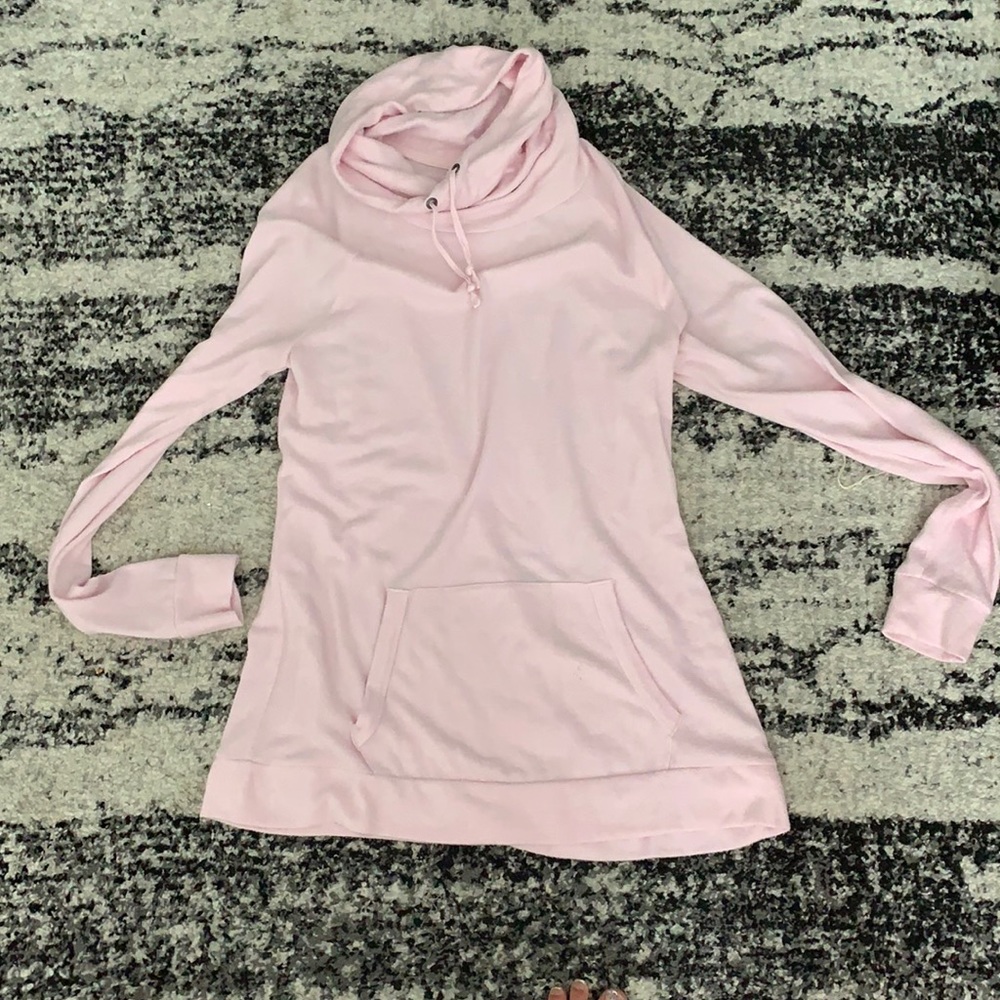 Pink Tek Gear sweater.